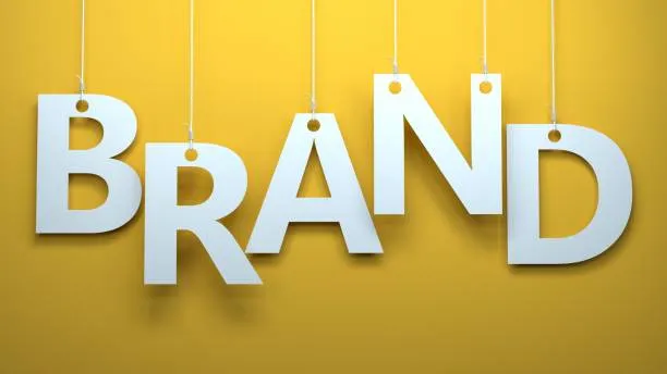 Fondo con la palabra Brand en grande representando la percepción de marca y su importancia en negocios.